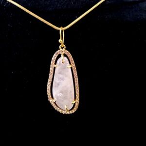 rose quartz necklace surrounded with CZ crytals
